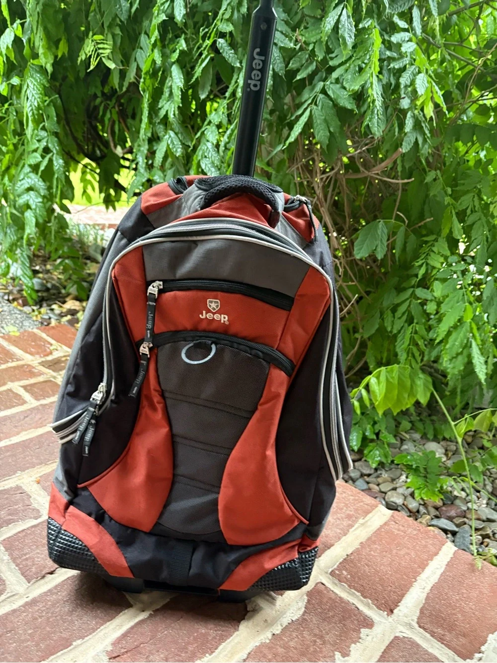 Jeep Rolling Backpack Carry On Luggage in Orange and Black CLEAN Good Condition